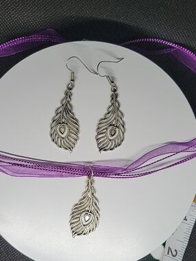 Silver Peacock Feather Earrings in Silver